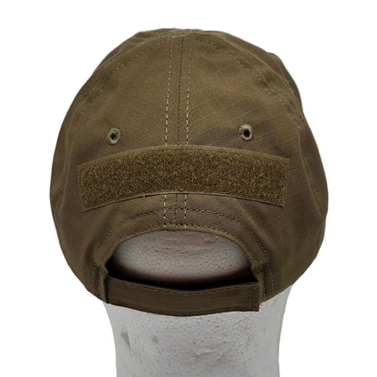 Brown cap inside a white box with a light source